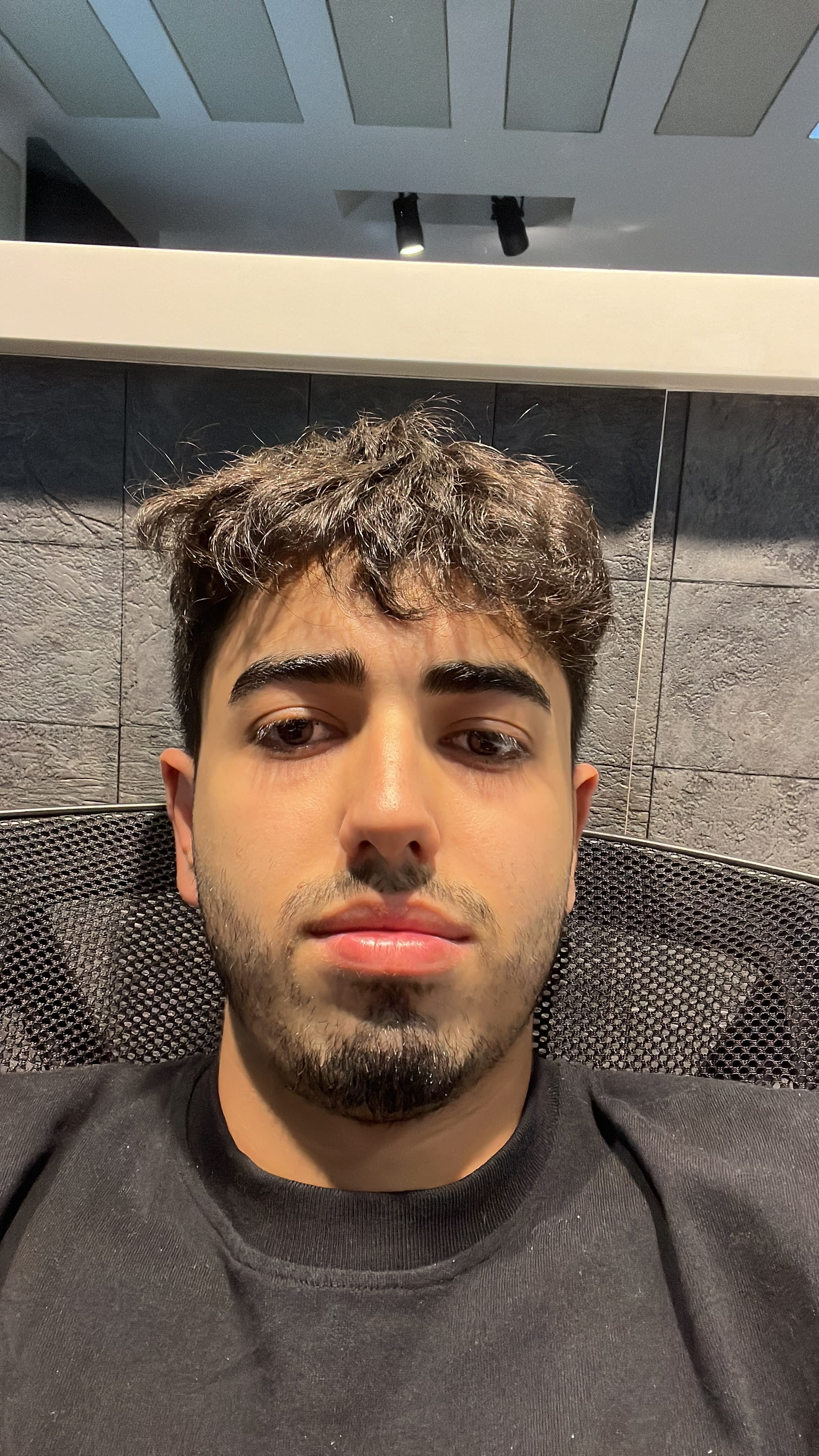 My badge on top of a pile of badges from a Vercel meetup we held